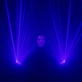 Beam gloves forming crossing lines for a rave DJ dance set