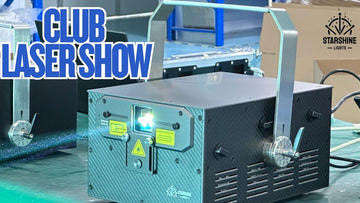 Club laser lights creating aerial beams in haze