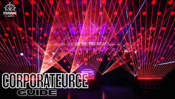 Corporate laser show beams over a seated audience at a brand event