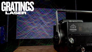 close up of laser diffraction grating lines under white light