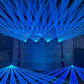 A15 RGB laser light projector displaying animated patterns