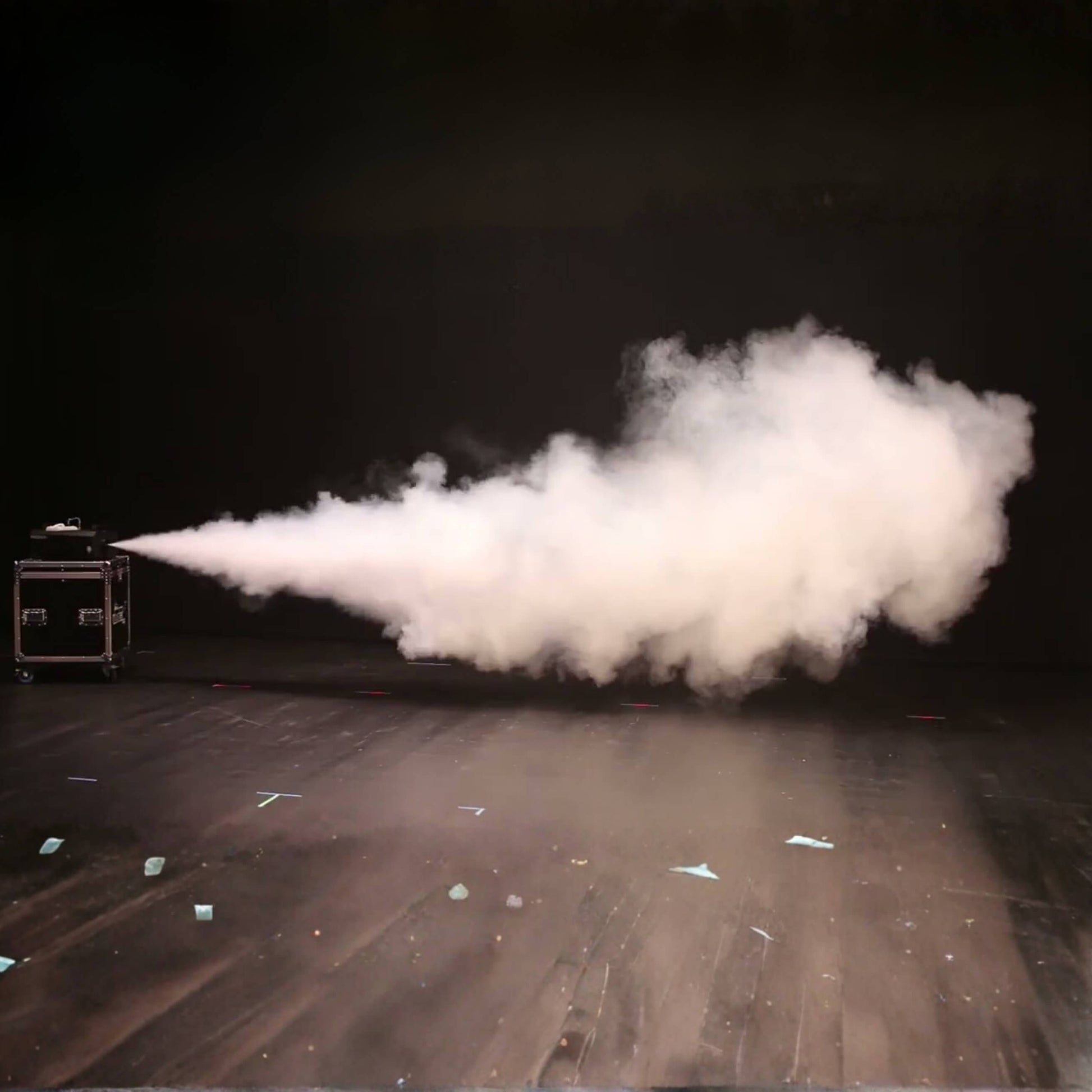 Stage fogger creating visible light beams