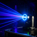 DJ stage lights with blue and purple laser beams