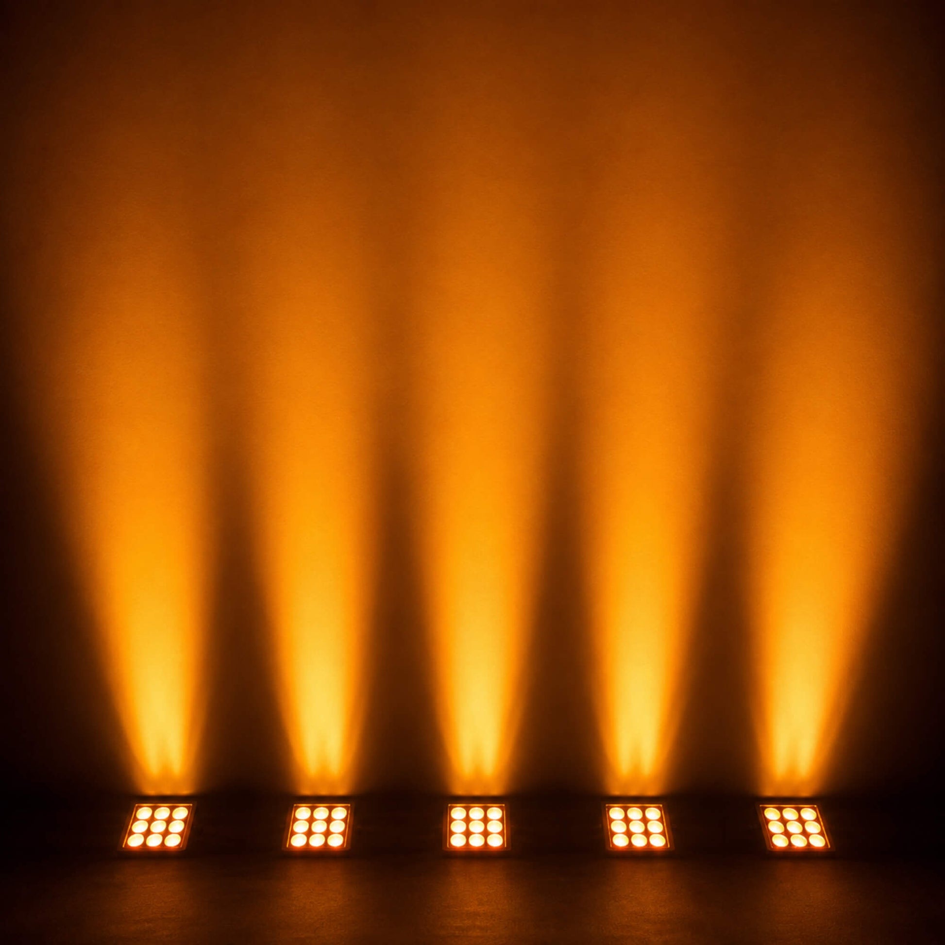 Outdoor stage lighting beside a swimming pool