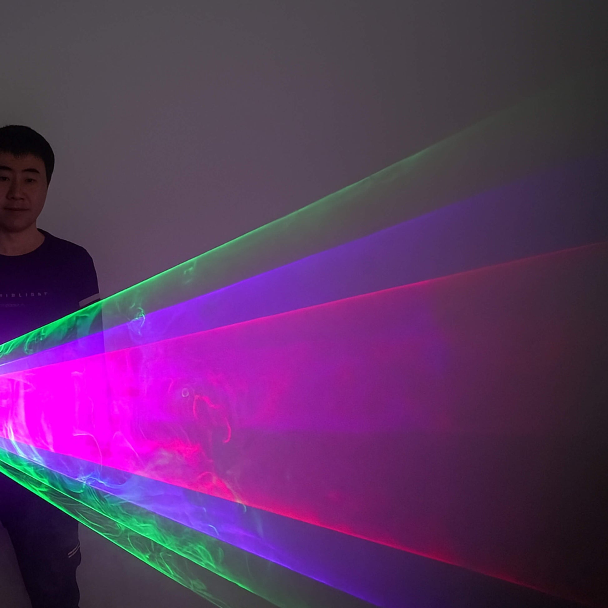 X12 laser light gloves hero shot with camera-ready red-green texture