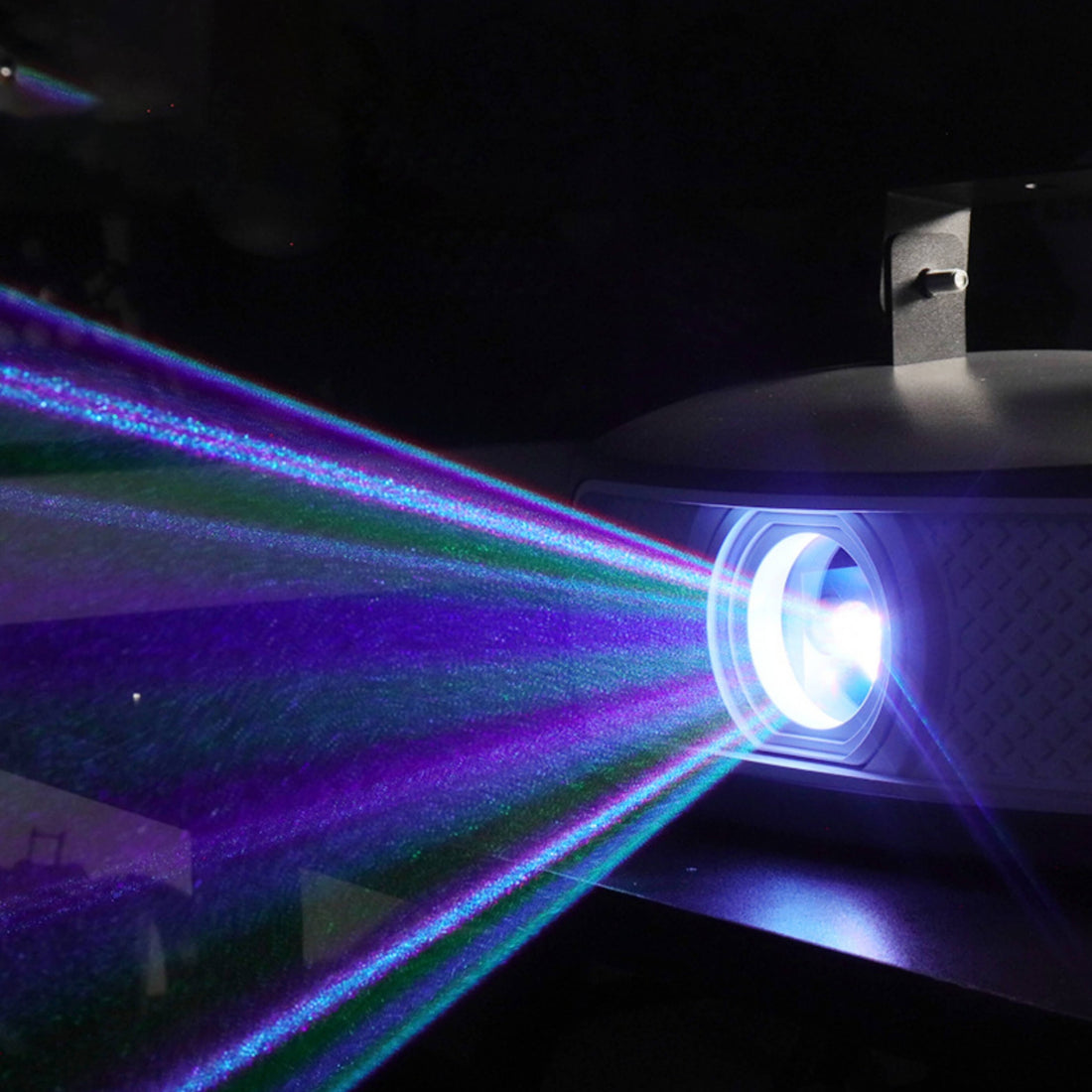 party laser lights projecting geometric patterns
